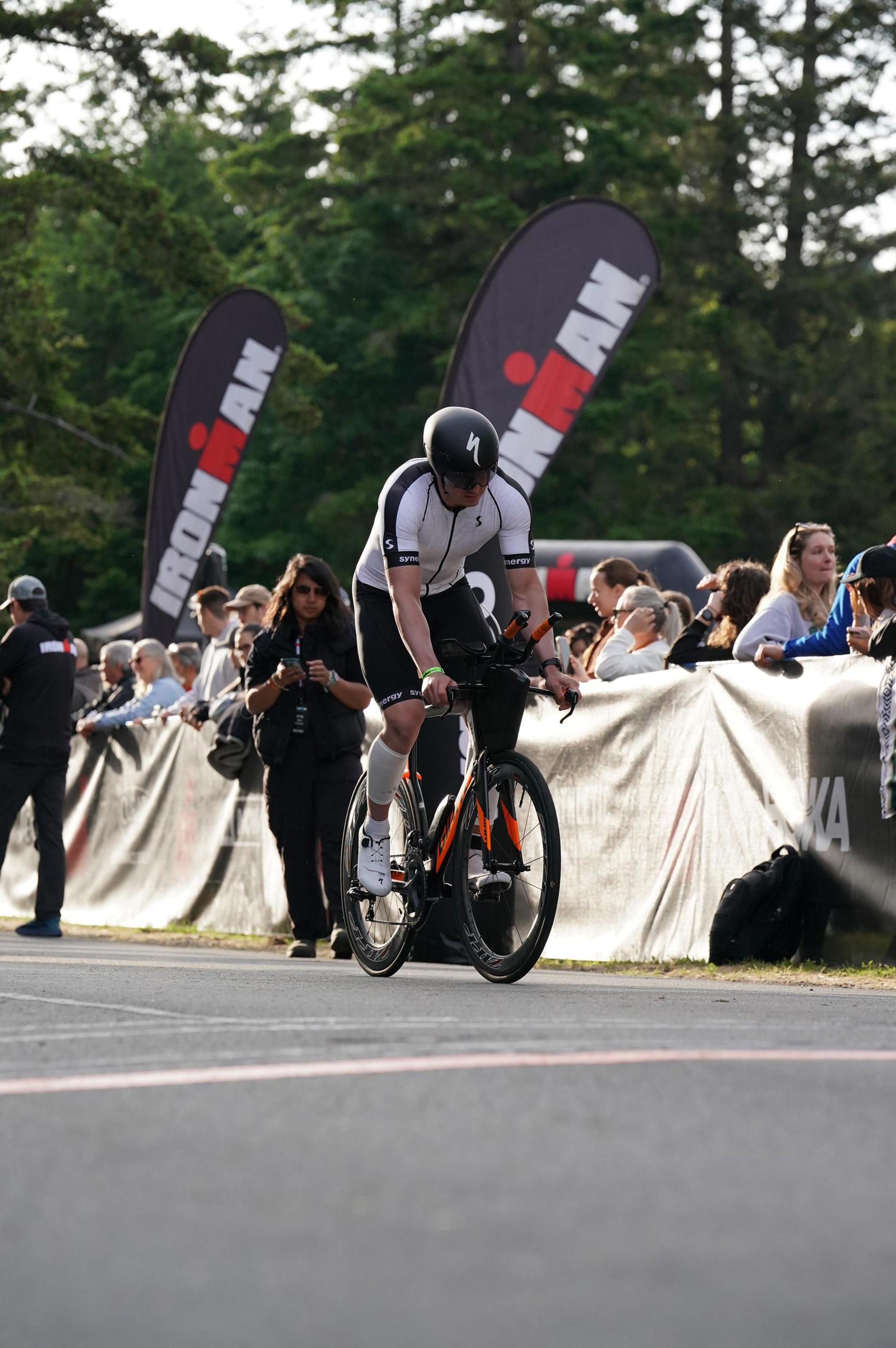 Martin Lavigne biking with crowd at Victoria