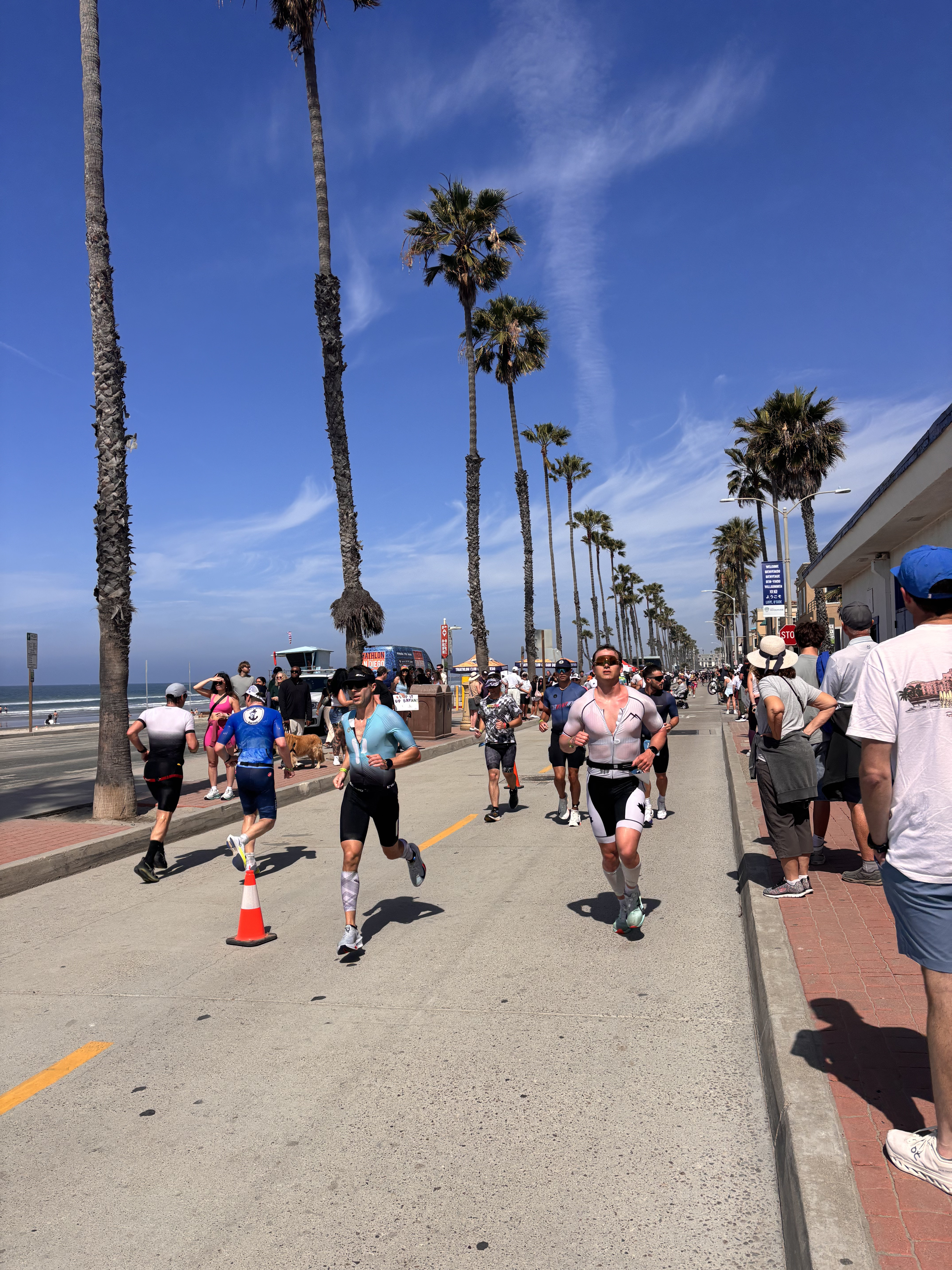 Martin Lavigne running on boardwalk at Oceanside